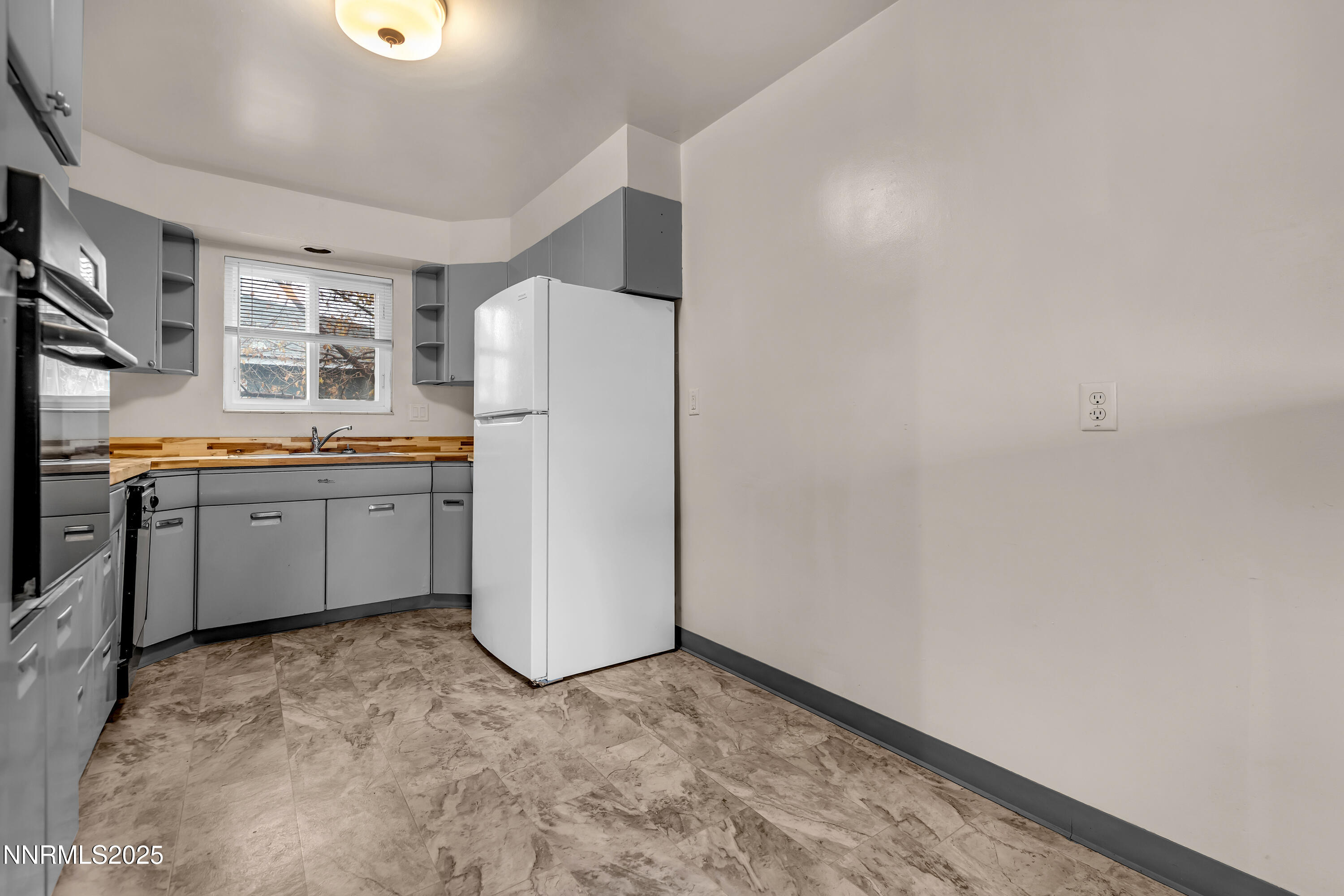 234 18th Street Sparks, NV 89431 - Photo 44 of 51 a view of a kitchen with a sink and cabinets