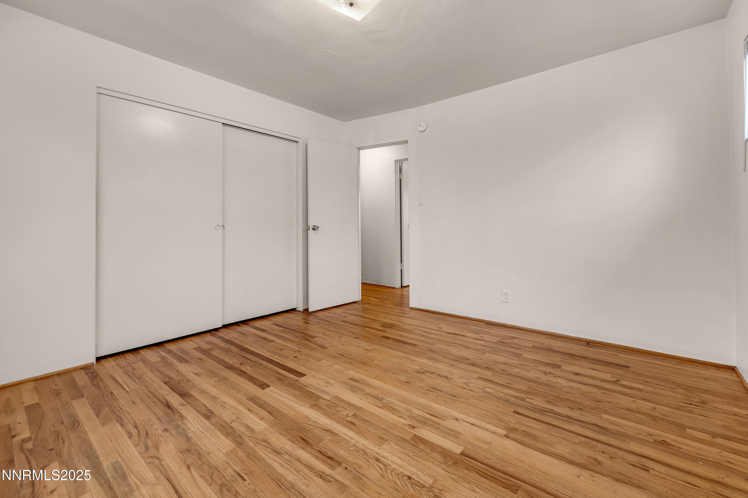 234 18th Street Sparks, NV 89431 - Photo 49 of 51 a view of an empty room and wooden floor