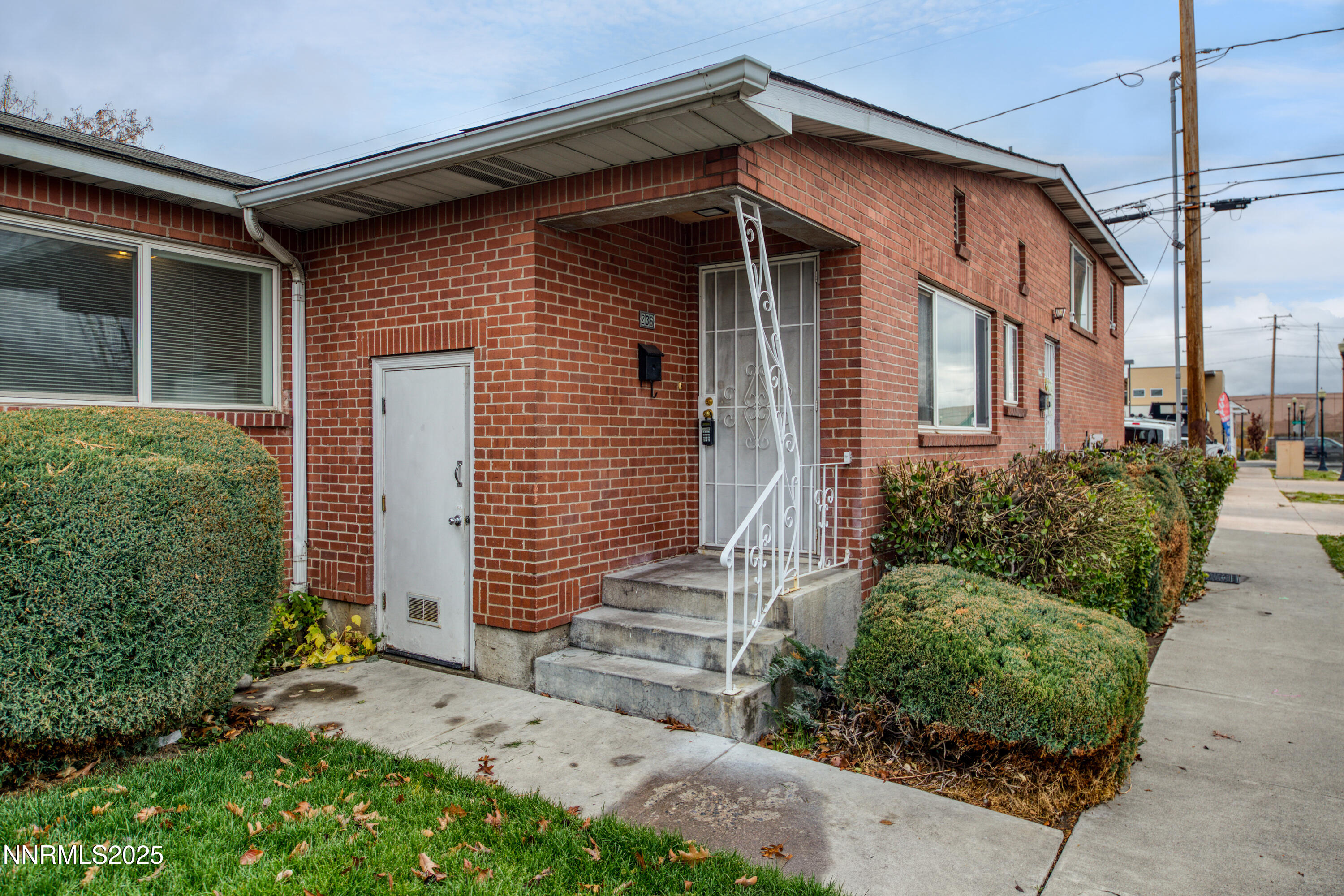 234 18th Street Sparks, NV 89431 - Photo 10 of 51 a front view of a house with a yard