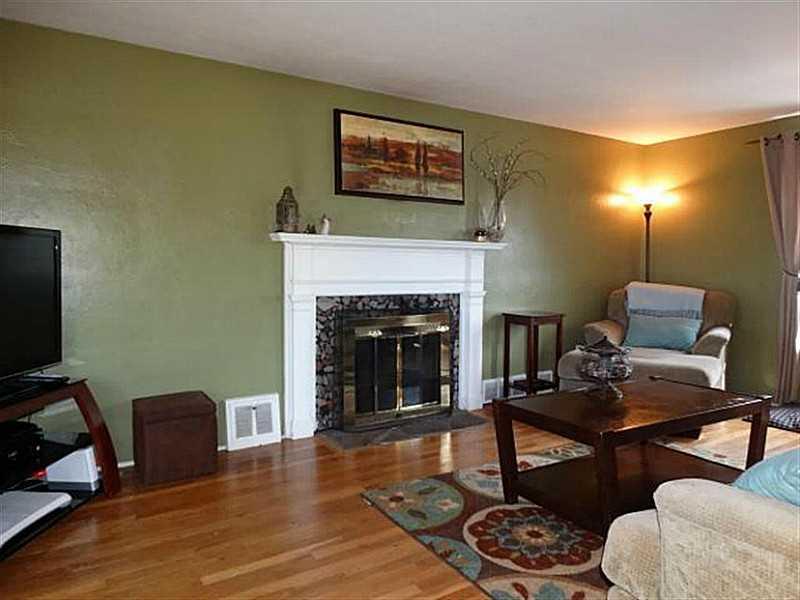 4309 Hamilton Road Whitehall, PA 15234 - Photo 5 of 22 Living Room. Wood burning fireplace.