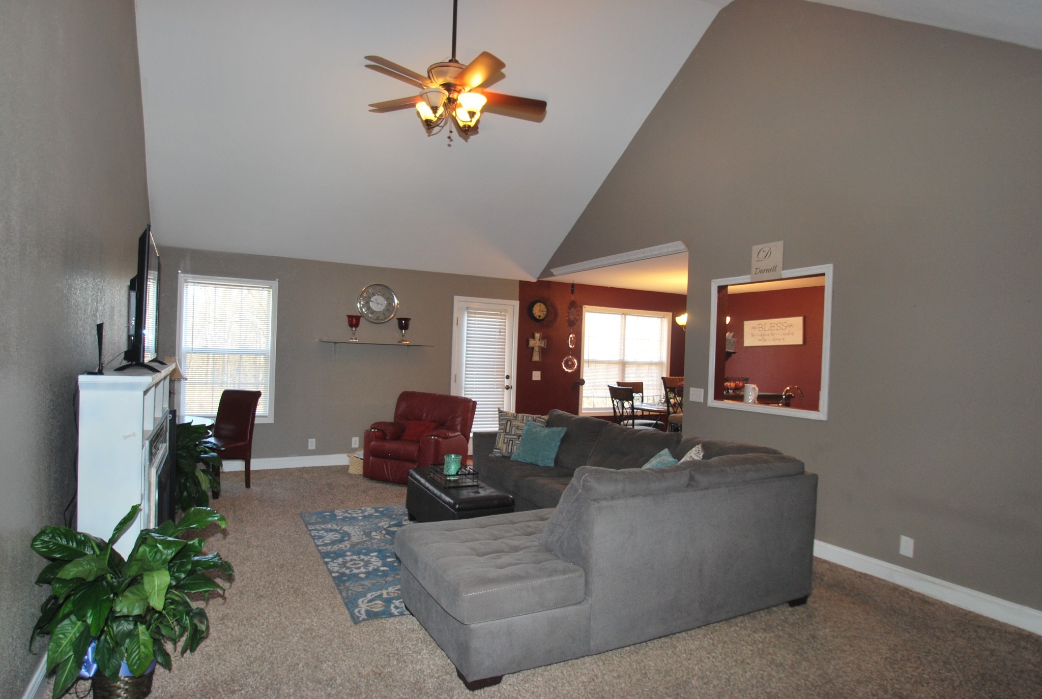 822 Red Hollow Drive Springfield, TN 37172 - Photo 11 of 19 a living room with furniture chandelier and a window