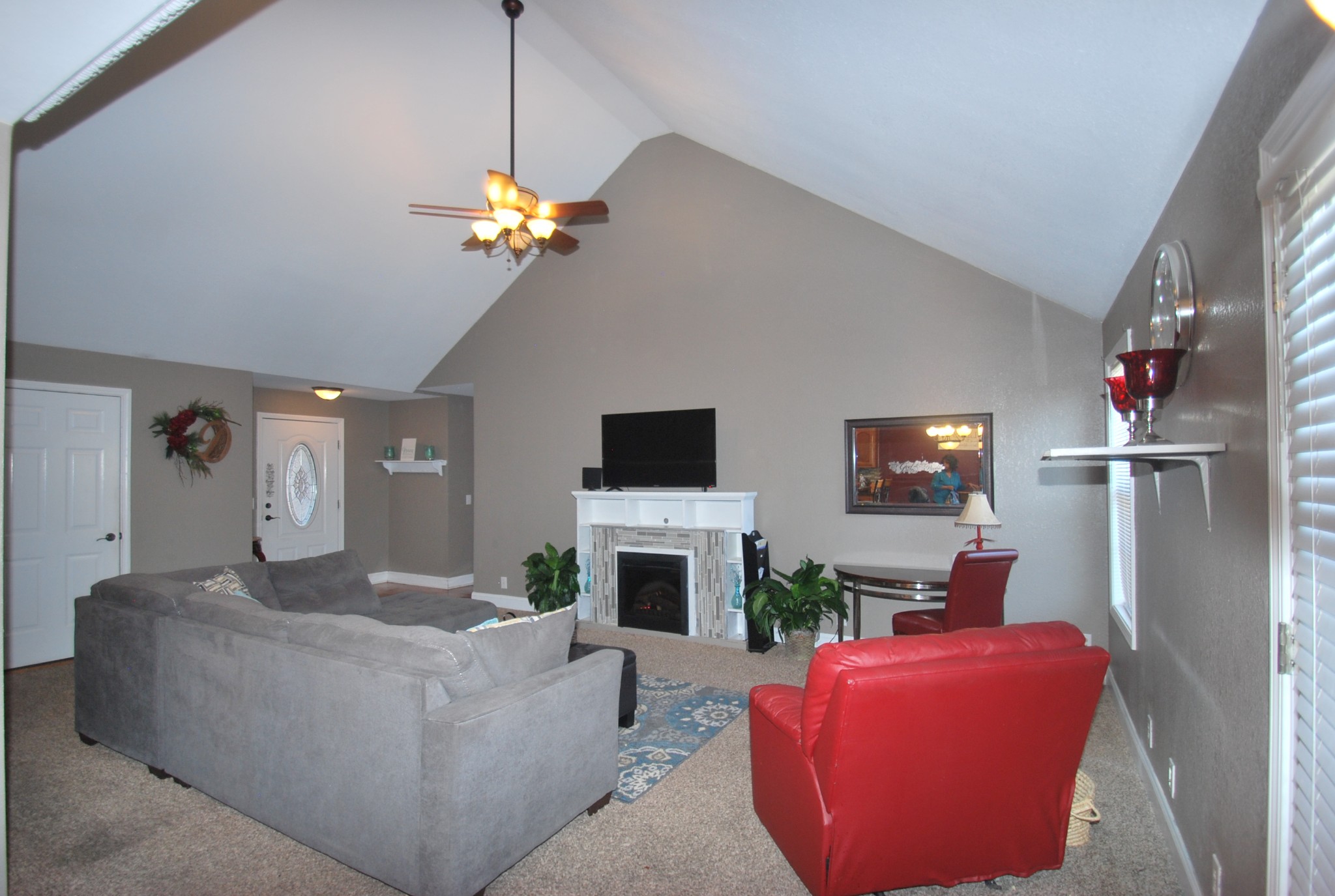 822 Red Hollow Drive Springfield, TN 37172 - Photo 10 of 19 a living room with furniture a fireplace and a flat screen tv