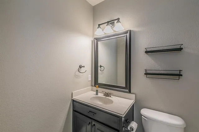 a view of cabinets and window