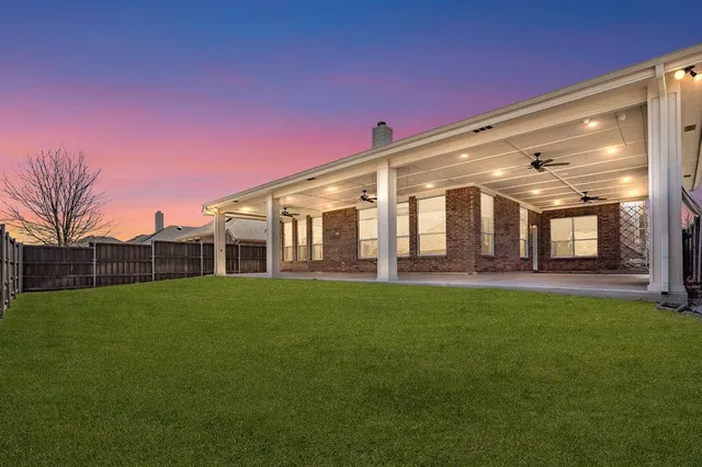 a view of a porch with a furniture