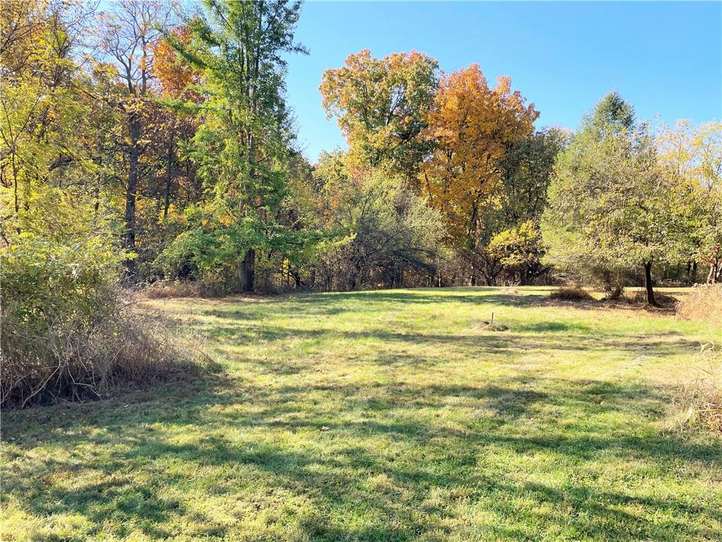 919 Harper Road Crescent, PA 15046 - Photo 11 of 41 a view of swimming pool with an outdoor space and seating area