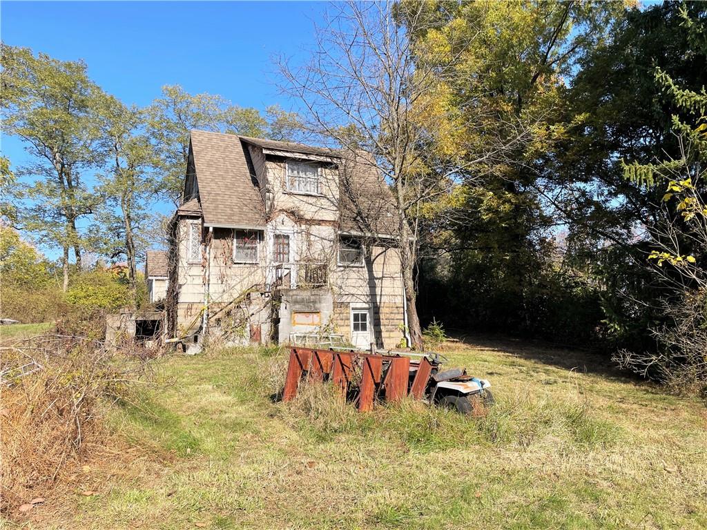 919 Harper Road Crescent, PA 15046 - Photo 34 of 41 a view of a backyard with a tree