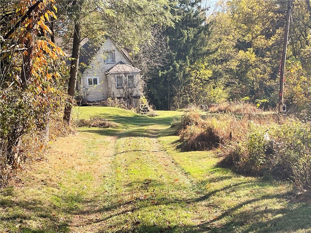 919 Harper Road Crescent, PA 15046 - Photo 4 of 41 a house with swimming pool in front of it
