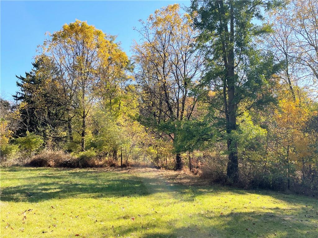 919 Harper Road Crescent, PA 15046 - Photo 5 of 41 a view of a swimming pool and trees in the background