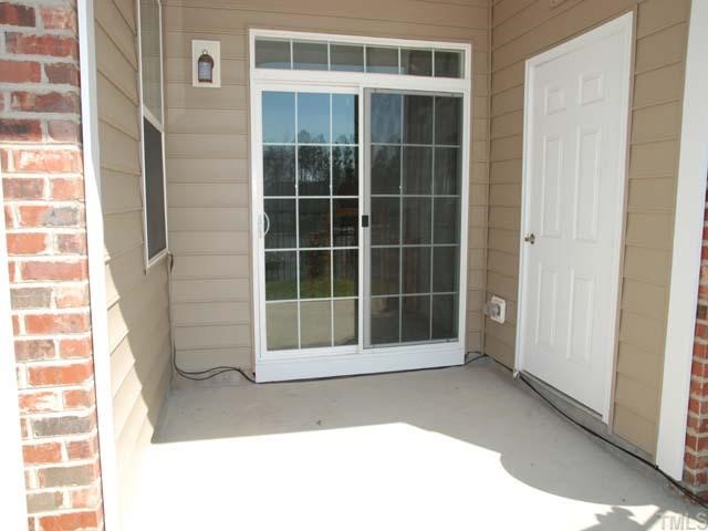10511 Rosegate Court, Unit 6 Raleigh, NC 27617 - Photo 7 of 11 a view of front door