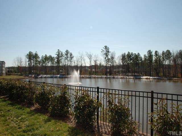 10511 Rosegate Court, Unit 6 Raleigh, NC 27617 - Photo 10 of 11 a view of lake with green space