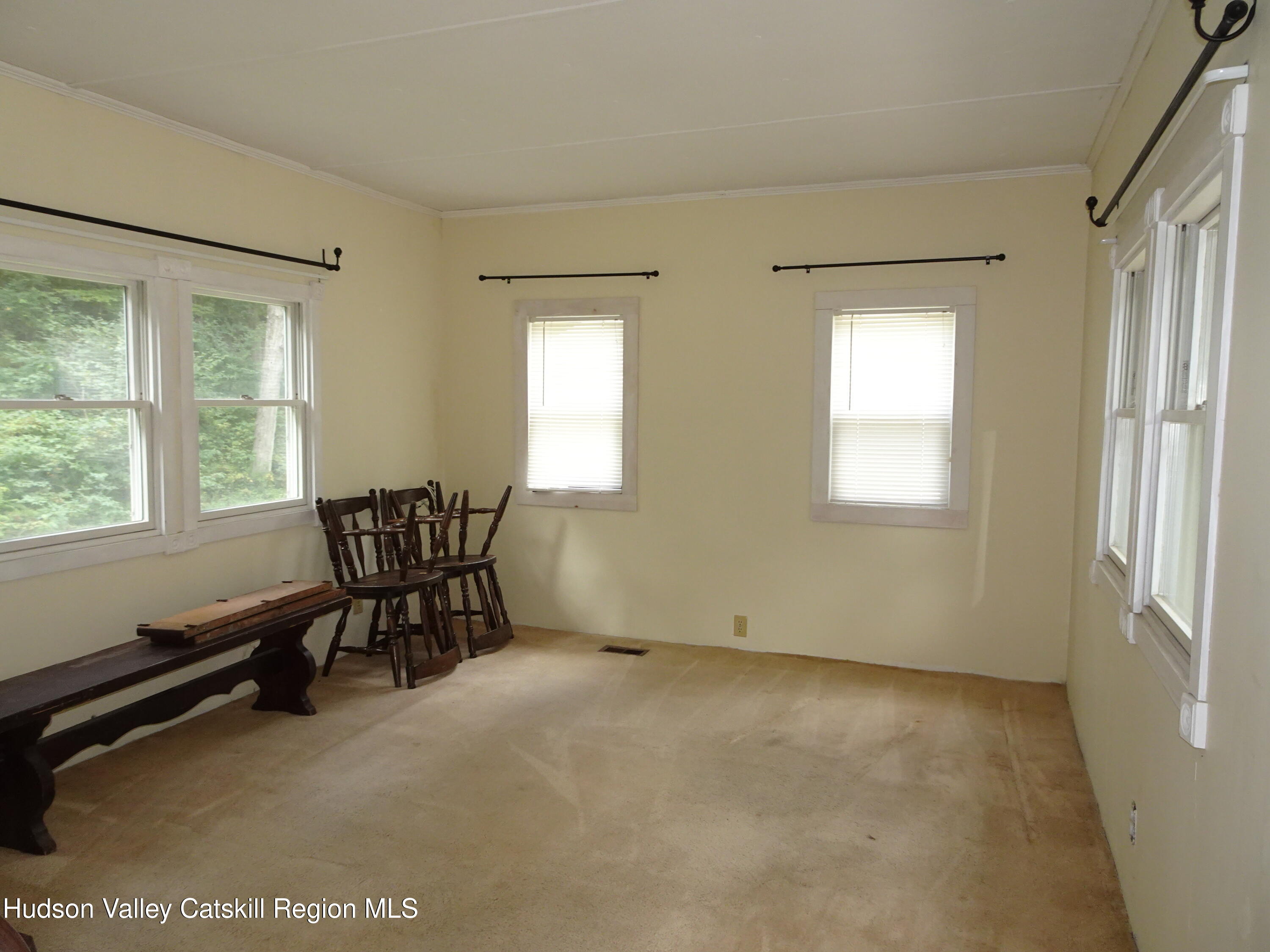 158 Middle Road Austerlitz, NY 12017 - Photo 7 of 20 a view of a room with furniture window and outside view