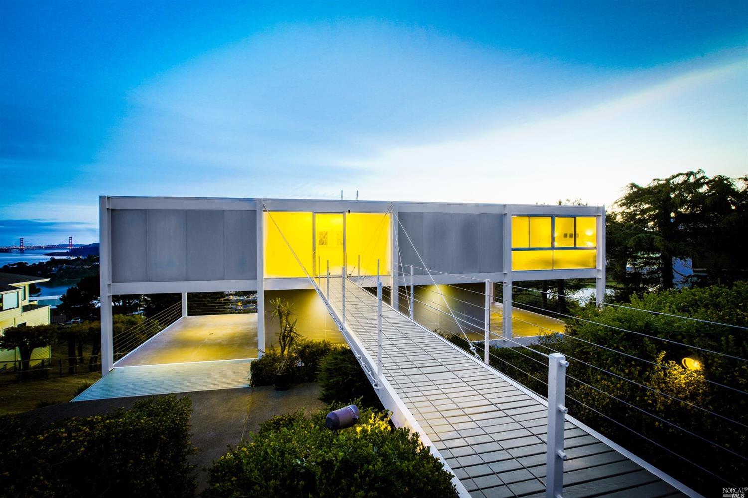 a swimming pool with outdoor seating and yard