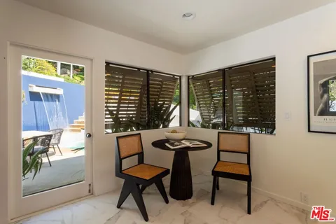 a view of a livingroom with furniture