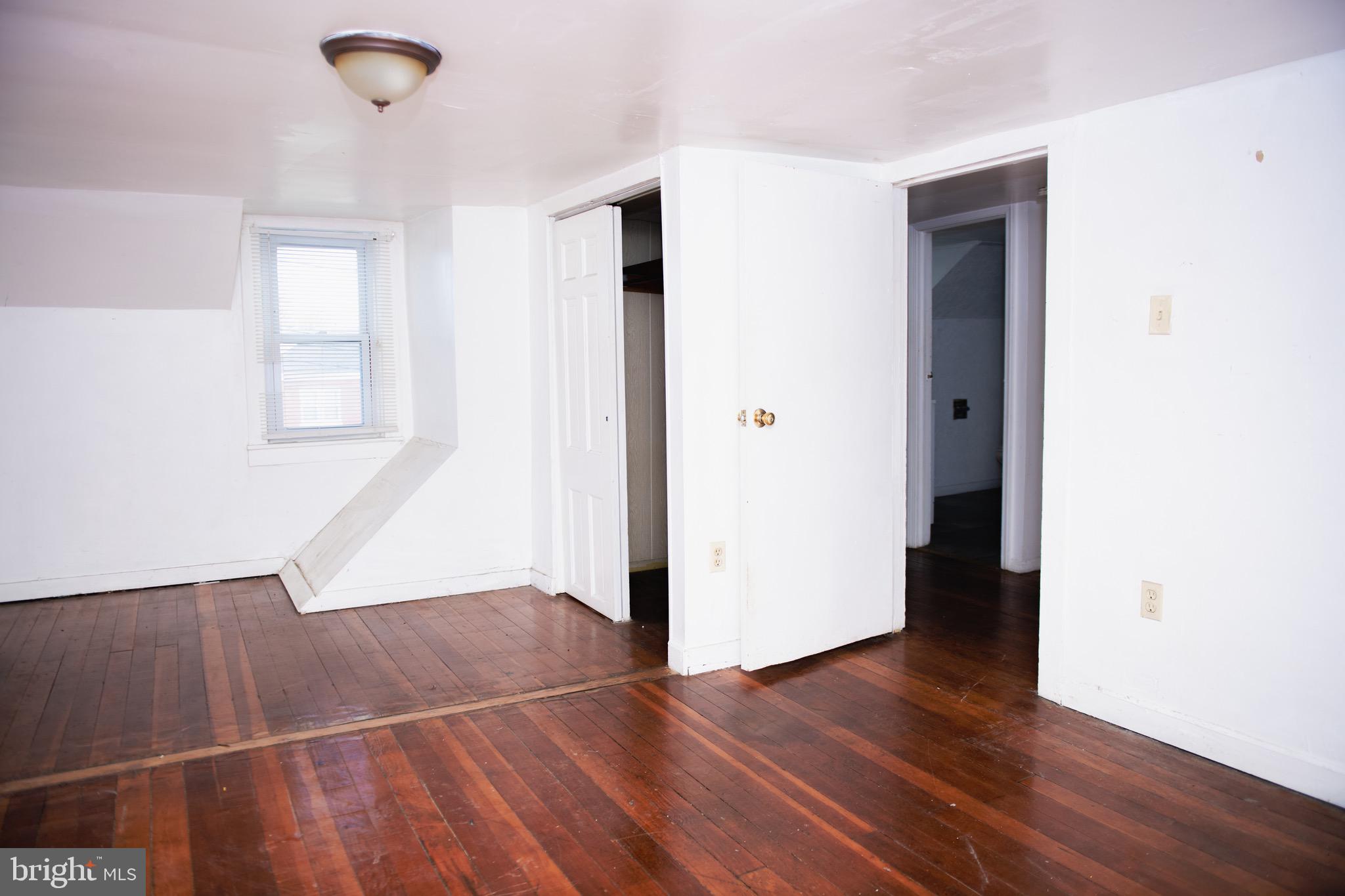 9 Hamilton Street New Castle, DE 19720 - Photo 20 of 20 a view of a room with wooden floor and white walls