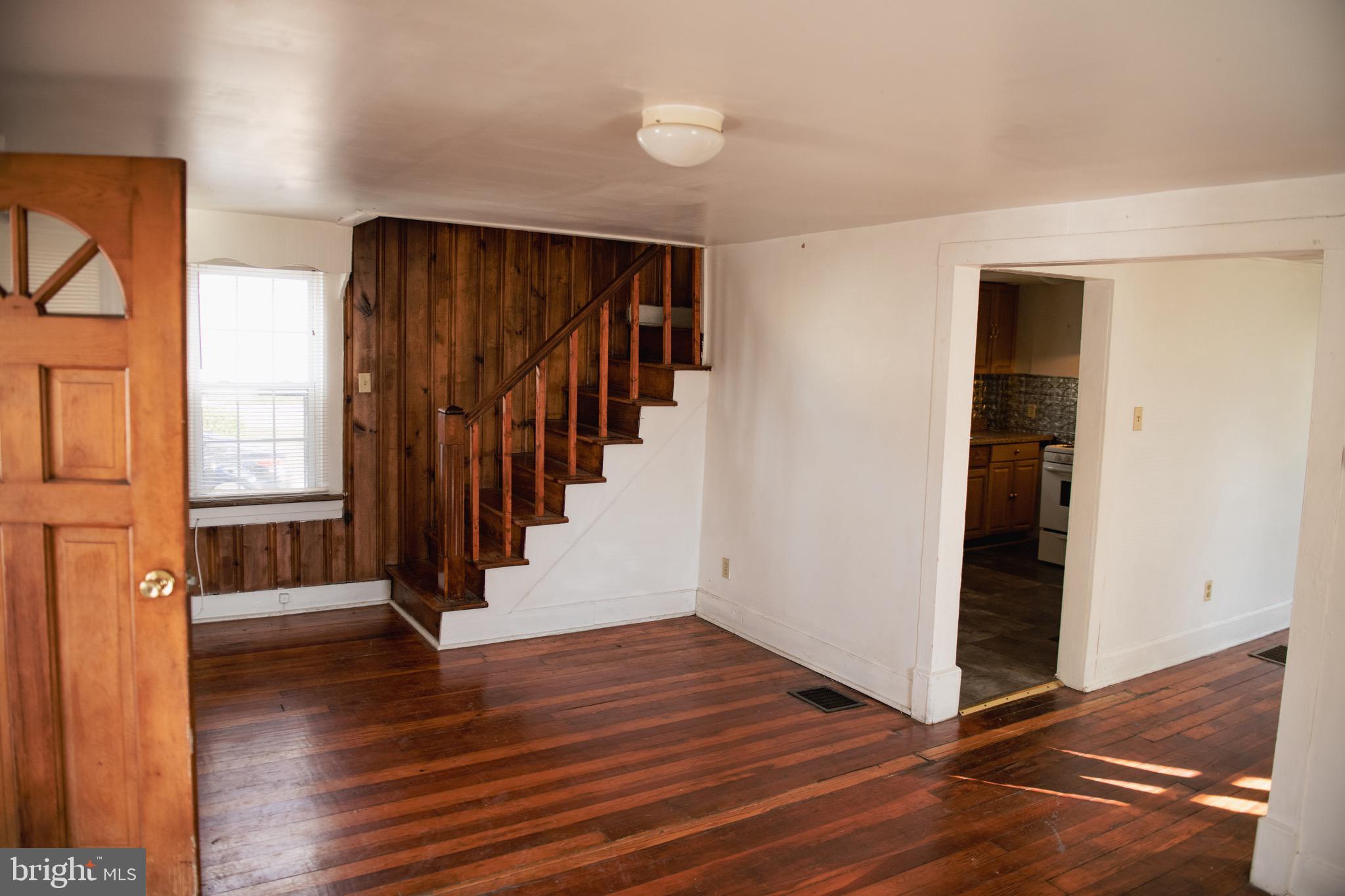 9 Hamilton Street New Castle, DE 19720 - Photo 9 of 20 an empty room with wooden floor and closet