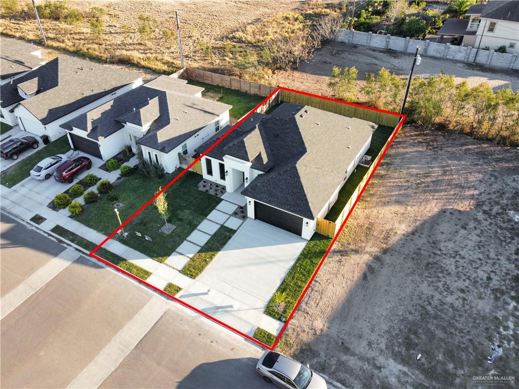 608 Spring Drive Alton, TX 78573 - Photo 25 of 32 Aerial view of residential area with property boundaries highlighted