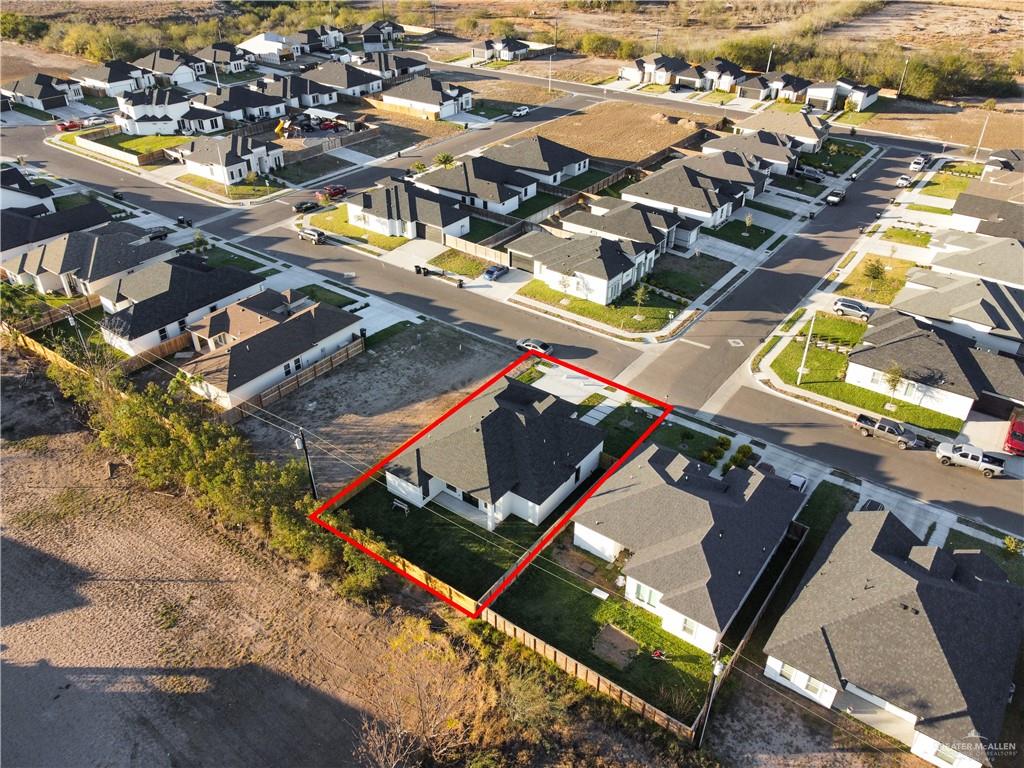 608 Spring Drive Alton, TX 78573 - Photo 30 of 32 Aerial perspective of suburban area featuring property parcel outlined