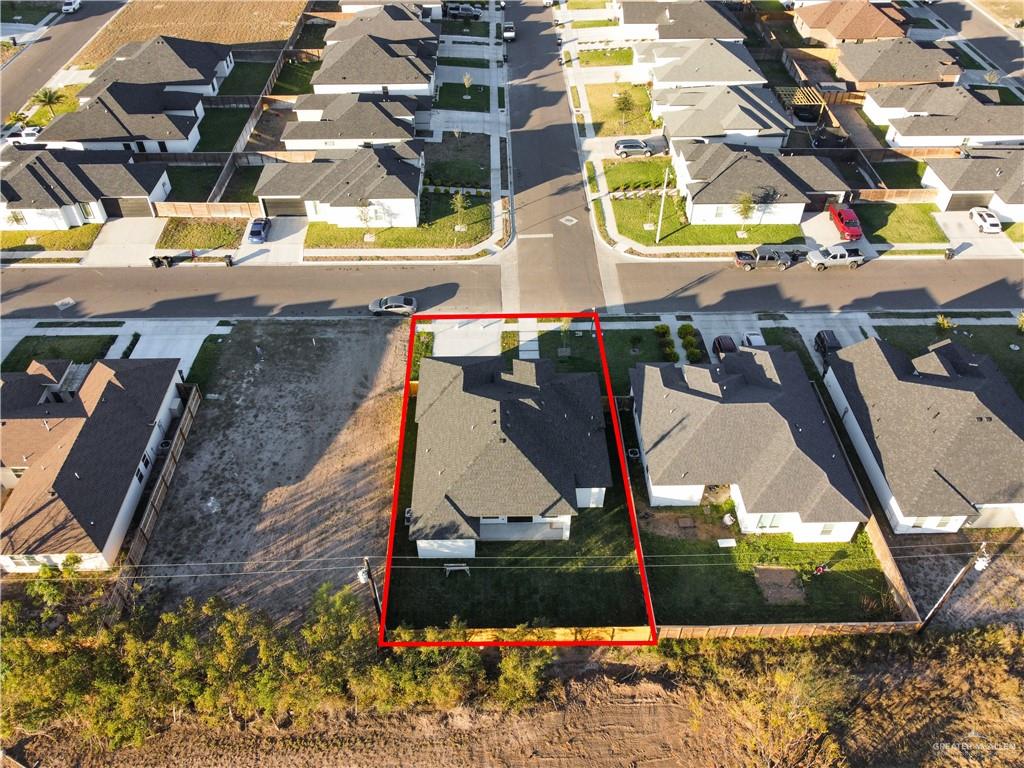 608 Spring Drive Alton, TX 78573 - Photo 31 of 32 Aerial perspective of suburban area featuring property parcel outlined