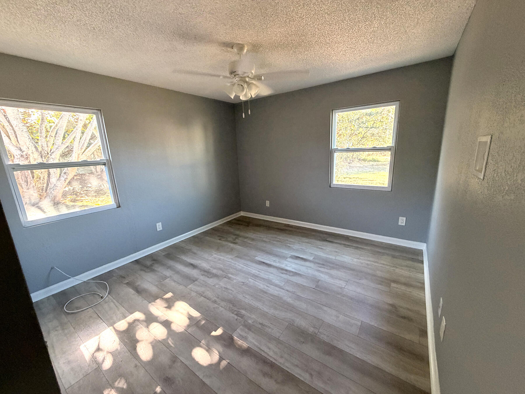 1902 Southeast Gena Road Port St. Lucie, FL 34952 - Photo 3 of 9 a view of an empty room and window