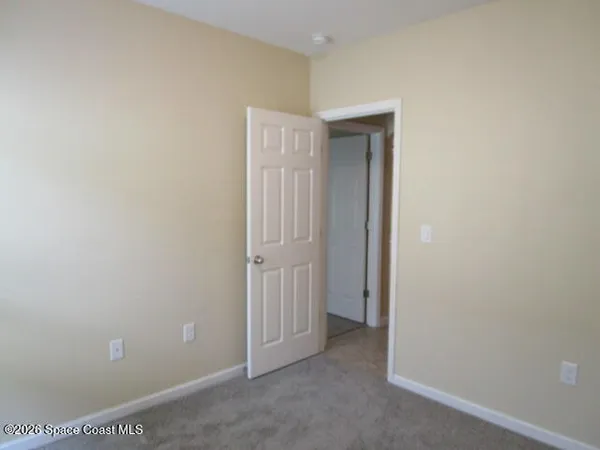 a bathroom with a shower curtain