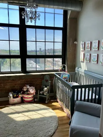 a view of a porch area with furniture