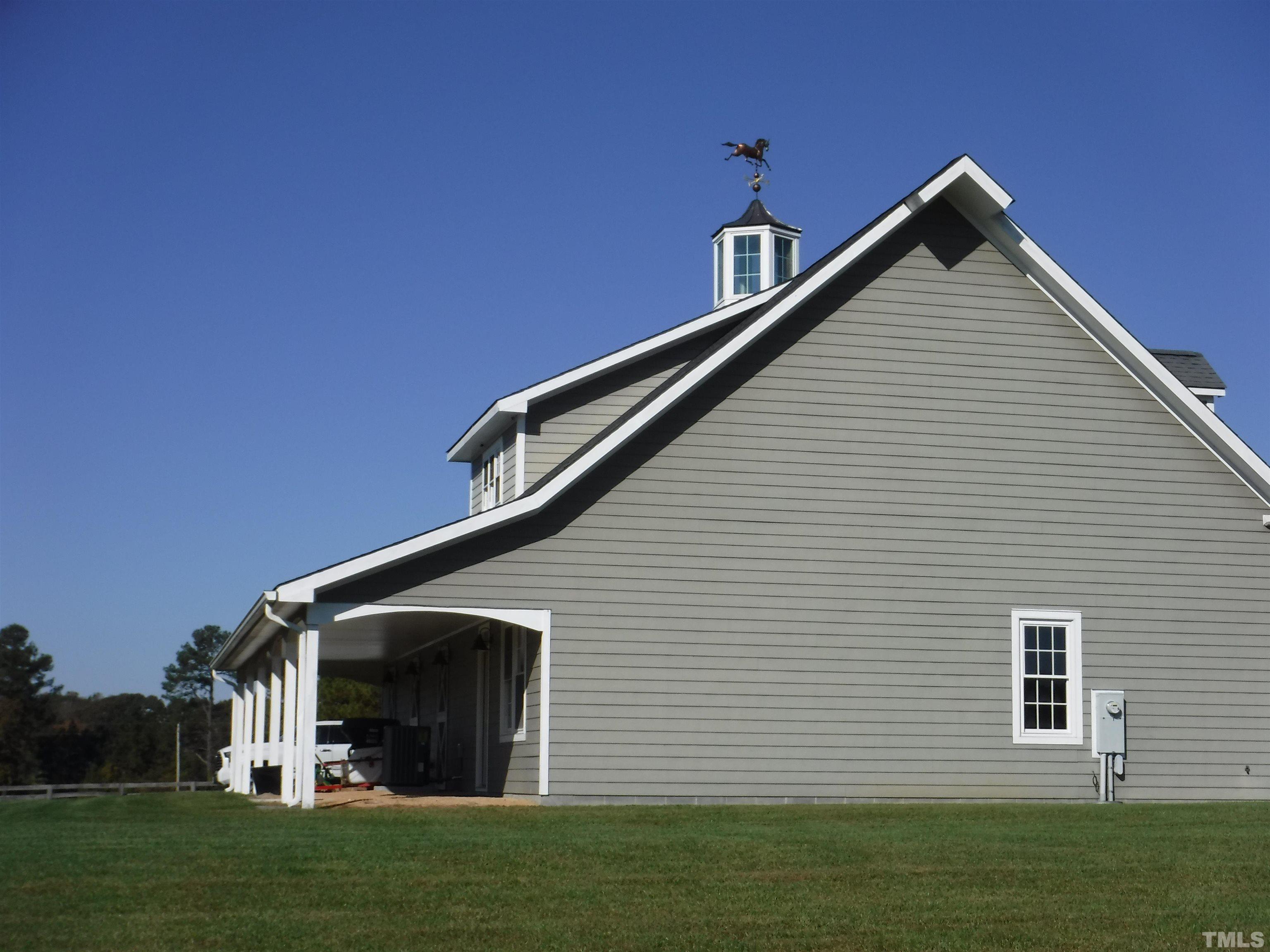 4708 Uzzle Road Rougemont, NC 27572 - Photo 11 of 51 a view of a house with a yard