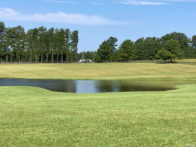 a view of a golf course with a garden