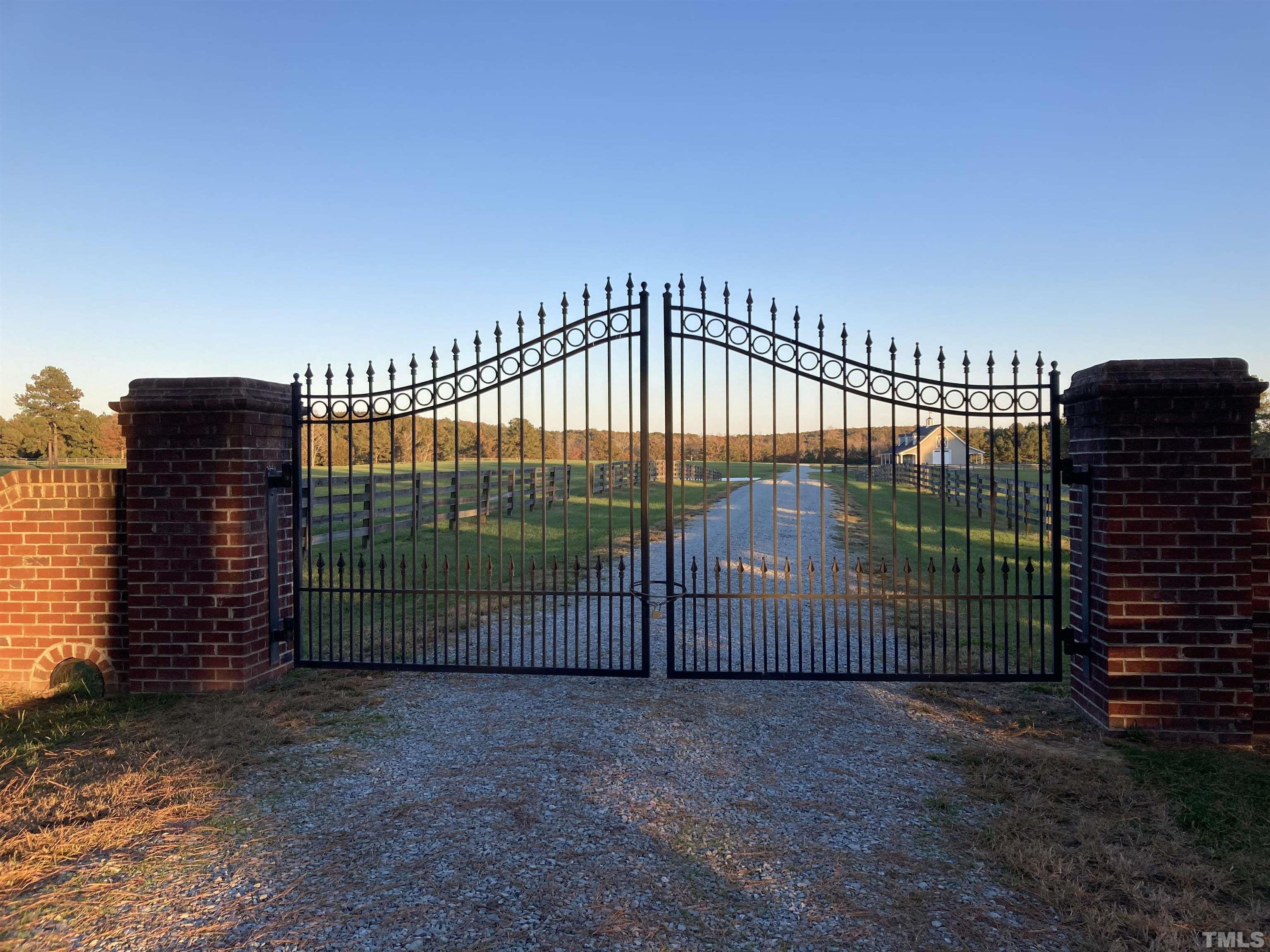 4708 Uzzle Road Rougemont, NC 27572 - Photo 3 of 51 a view of a building with a outdoor space