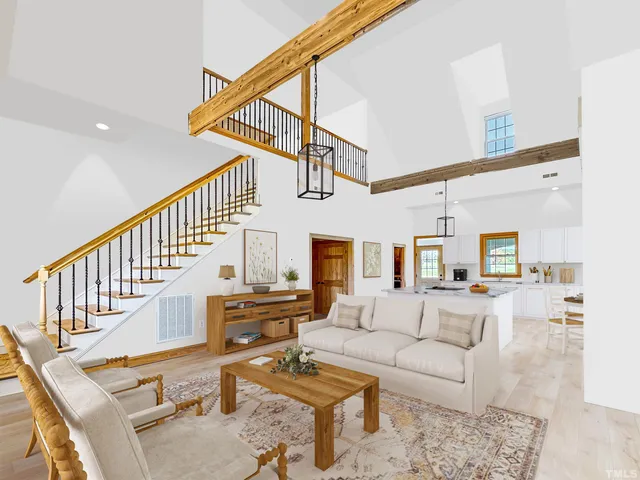 a view of a lake with houses in the background