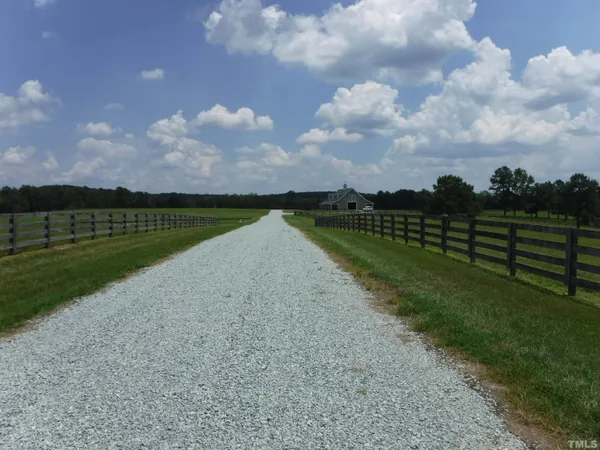 a view of a lake with a big yard
