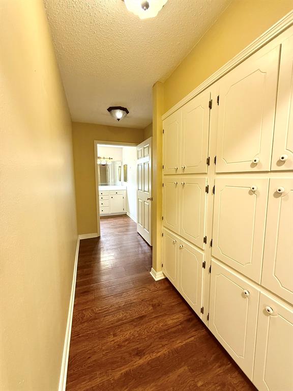 11535 Timber Ridge Drive Keithville, LA 71047 - Photo 23 of 39 a view of a hallway with wooden floor