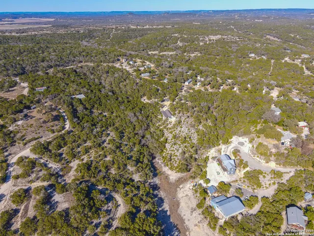 a view of city with green space