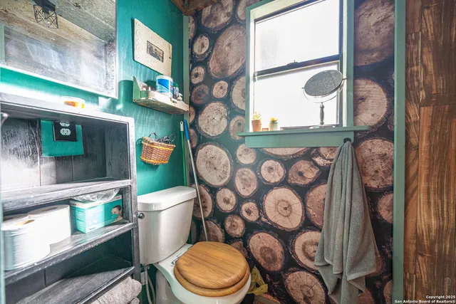 a view of a patio with table and chairs