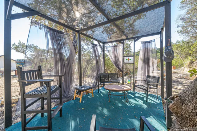 a view of a yard with trees