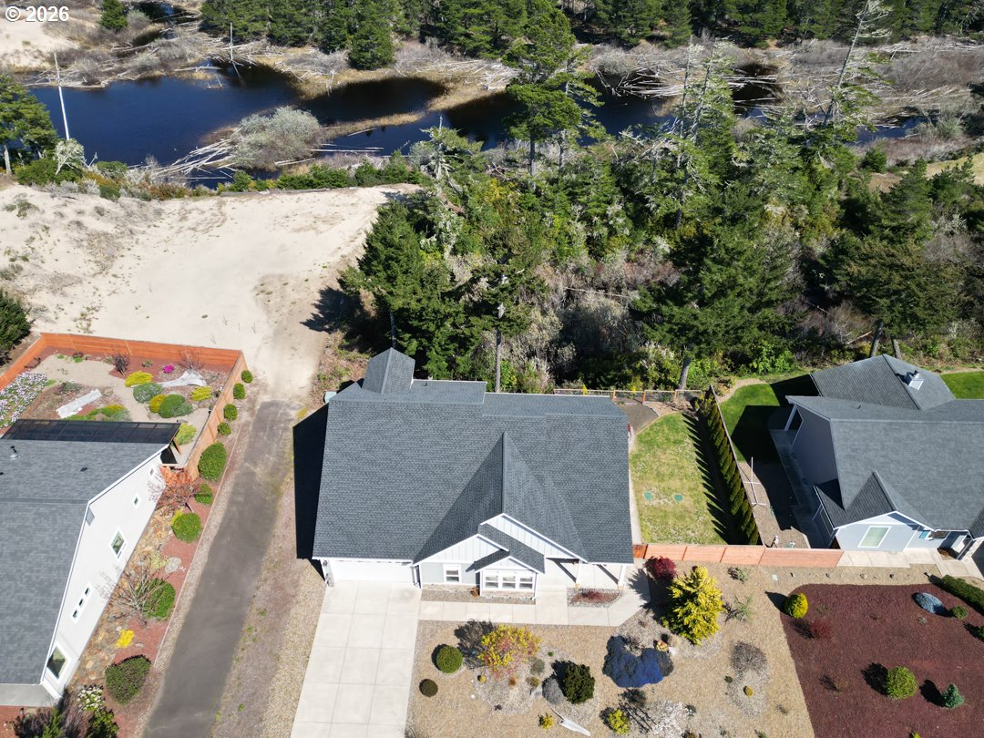 88097 Lake Point Drive Florence, OR 97439 - Photo 3 of 48 an aerial view of house with yard