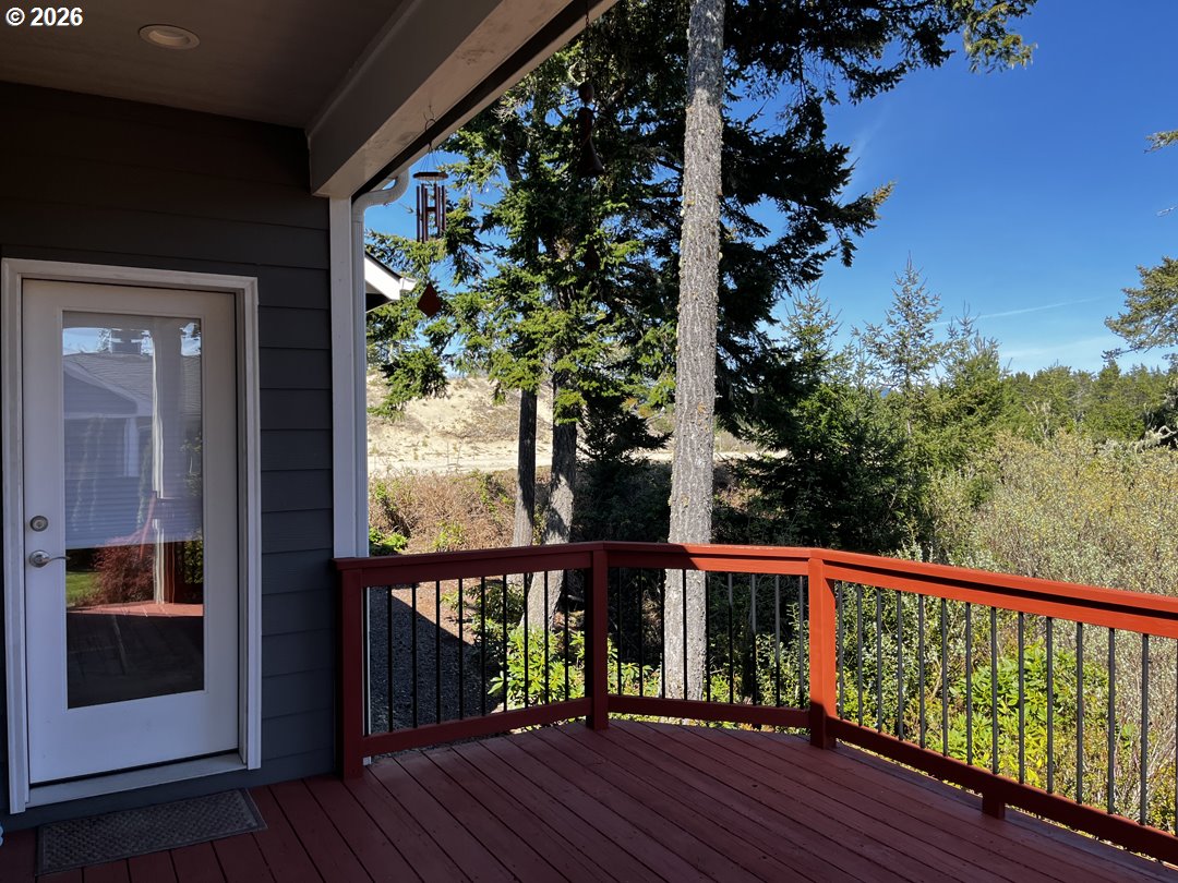 88097 Lake Point Drive Florence, OR 97439 - Photo 44 of 48 a view of balcony with wooden floor