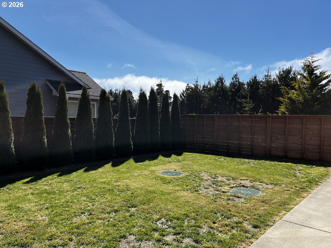 88097 Lake Point Drive Florence, OR 97439 - Photo 45 of 48 a view of backyard with green space