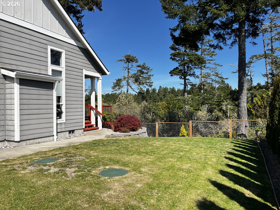 88097 Lake Point Drive Florence, OR 97439 - Photo 46 of 48 a view of a house with a yard
