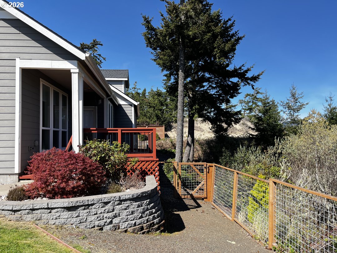 88097 Lake Point Drive Florence, OR 97439 - Photo 47 of 48 a view of a chairs and table in the balcony