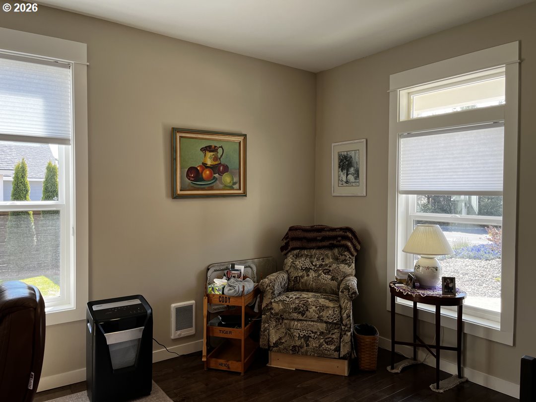 88097 Lake Point Drive Florence, OR 97439 - Photo 8 of 48 a bedroom with a bed and a window