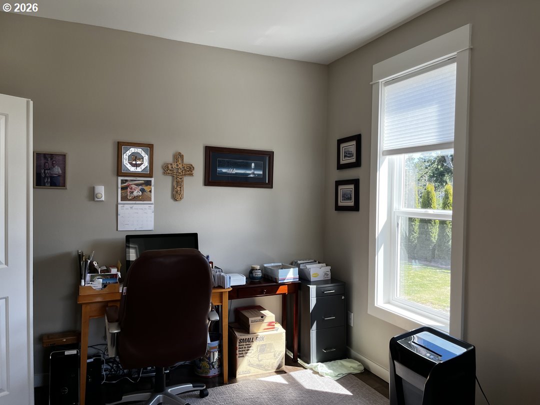 88097 Lake Point Drive Florence, OR 97439 - Photo 9 of 48 a view of workspace with wooden floor windows and piano