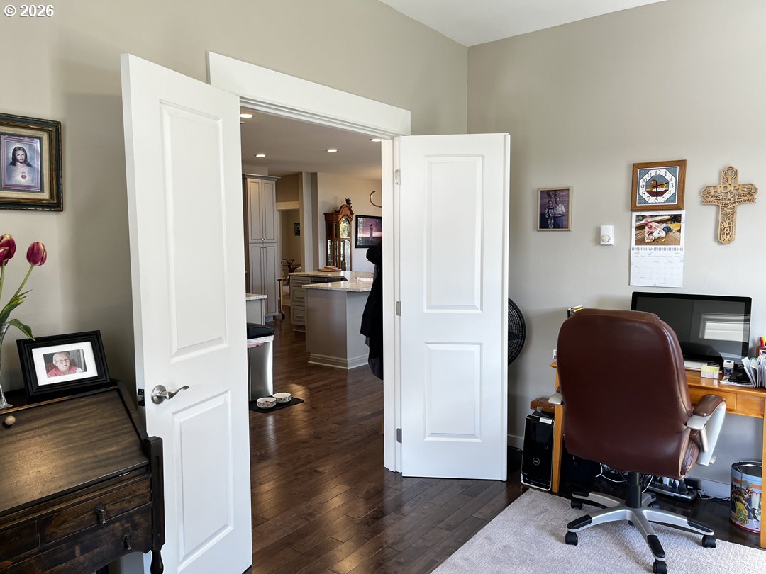 88097 Lake Point Drive Florence, OR 97439 - Photo 10 of 48 a view of a workspace with furniture and a livingroom