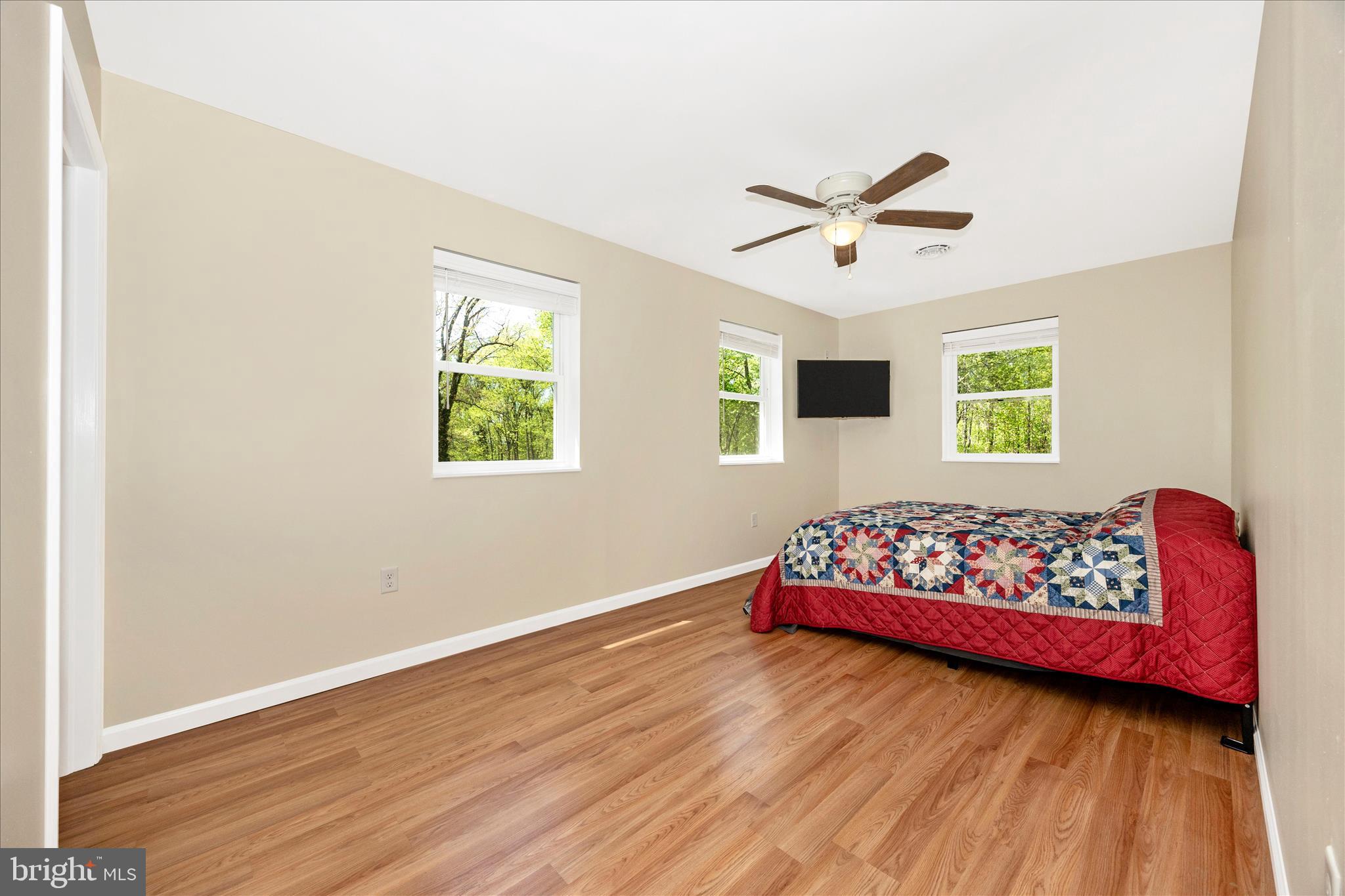 6518 Woodville Road Mount Airy, MD 21771 - Photo 26 of 53 a bedroom with a bed and a window