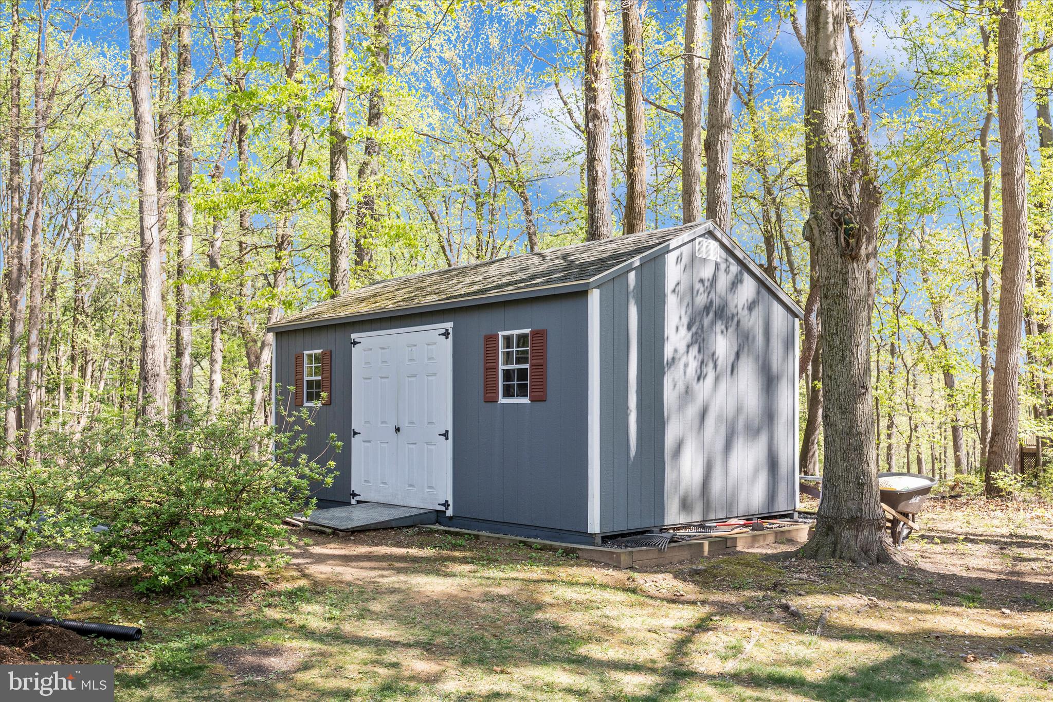 6518 Woodville Road Mount Airy, MD 21771 - Photo 47 of 53 a view of house with backyard and trees