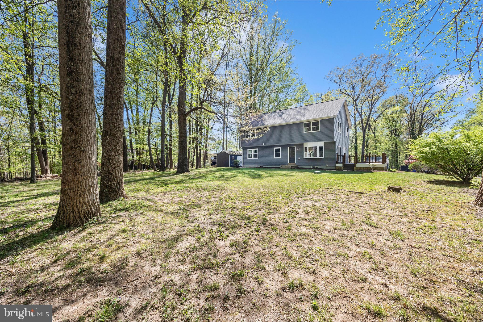 6518 Woodville Road Mount Airy, MD 21771 - Photo 53 of 53 a view of a house with a yard