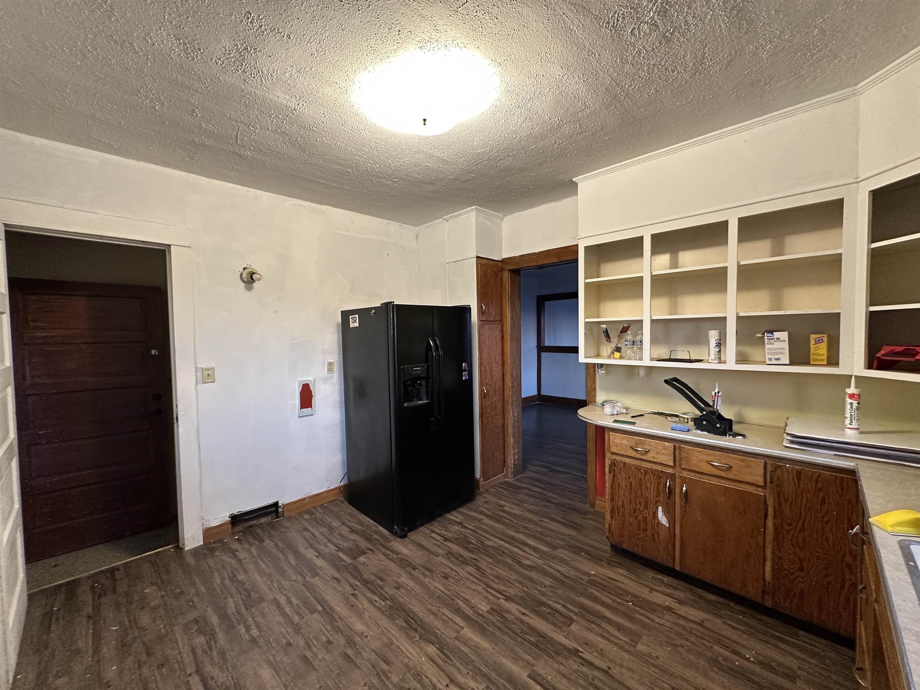 2750 North Henderson Road Freeport, IL 61032 - Photo 8 of 19 a kitchen with stainless steel appliances granite countertop a refrigerator and a sink