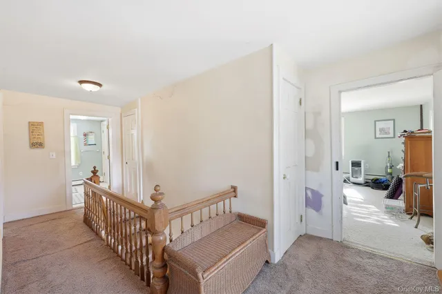 a view of a bedroom with baby crib
