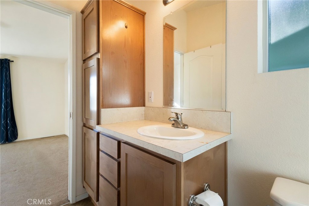 1798 Stearns Road Paradise, CA 95969 - Photo 14 of 39 a bathroom with a sink and a mirror
