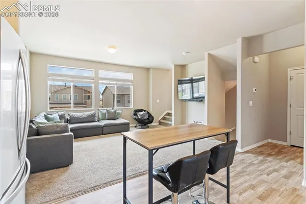 a living room with furniture and a table