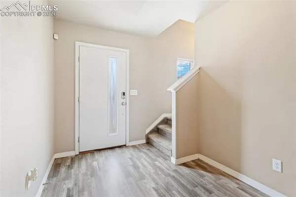 a view of an entryway with staircase